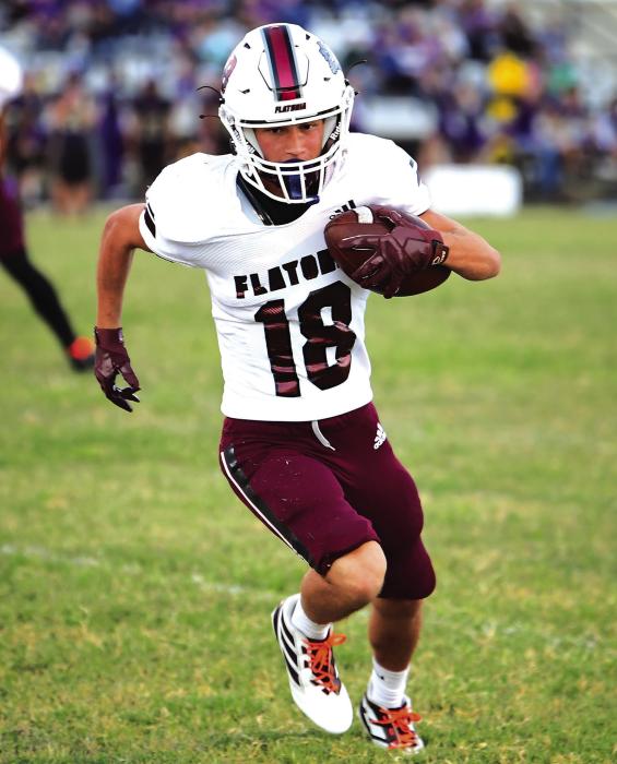 With 8:54 left in the 4th quarter of Friday’s district game against Holland, Colt Freytag runs in for a touchdown. The Flatonia Bulldogs defeated the Holland Hornets to take 1st place in the district. Photo by Stephanie Steinhauser