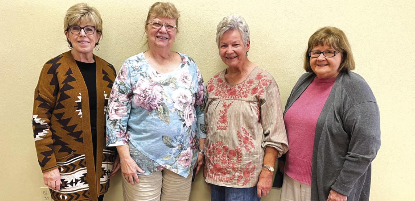 Pictured from left are Sally Garrett, County Extension Agent-Family and Community Health, Janice Alexander, Lila Garlin, and Helen Wagner.