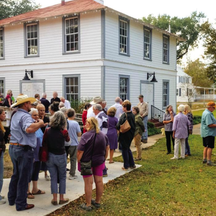 A big crowd of mostly members from Bethlehem Lutheran Church wait outside the courthouse for the Town Council meeting to start last Thursday. Photo by Andy Behlen