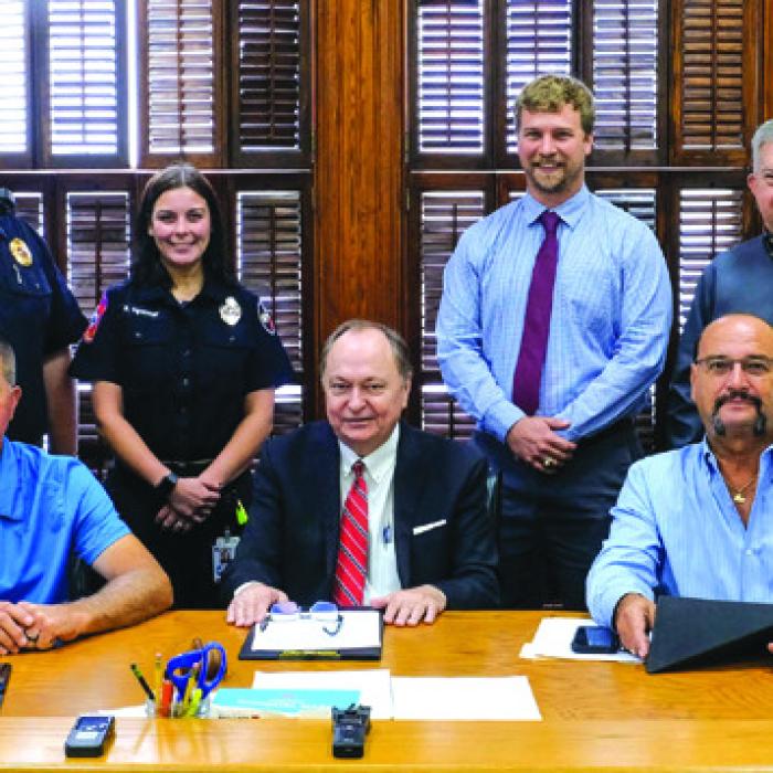Photo ID: (back, from left) Fayette County EMS Director Josh Vandever, paramedic student Rebecca Spooner, Kyle Hartmann of La Grange Rotary Club and CVTC General Manager Kelly Allison. Front row: Fayette County Commissioners Court, Drew Brossmann, Harvey Berckenhoff, Judge Dan Mueller, Luke Sternadel, Jason McBroom. Photo by Andy Behlen
