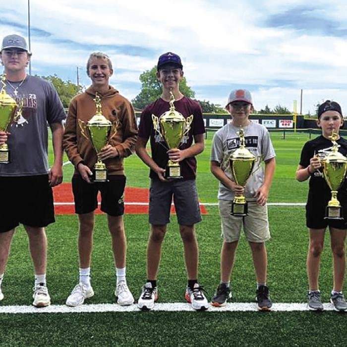 Winners of the home run derby left to right: Josh Vitek, Parker Vitek, Kole Schmitt, Dylan Henneke, Ethan Keilers, Jake Schley, Brady Noska and Decker Vitek.