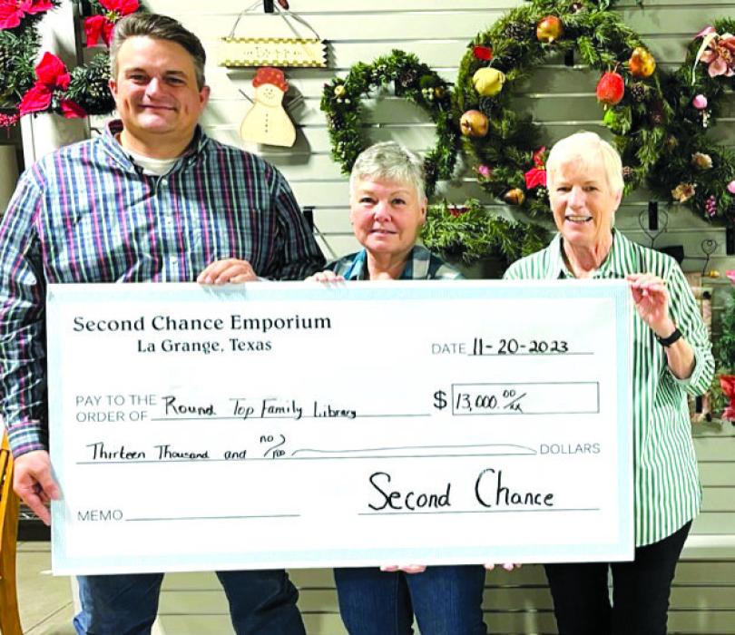 Second Chance Donates to Band Booster Club, RT Family Library