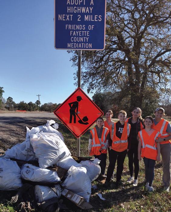 Pictured are the litter collectors who cleaned up US 77 north of La Grange: (from left) Addy Emmel and Makenna Emmel, and Eli, Faith, Paisley, and Lorretta Greenwood. The group wishes everyone a happy holiday season and asks that you, please, ‘Don’t Mess with Texas.’