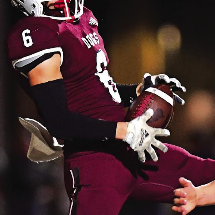 Titan Targac with a reception for a Bulldog touchdown in Thursday’s 59-32 bi-district win over Junction. Photo by Stephanie Steinhauser