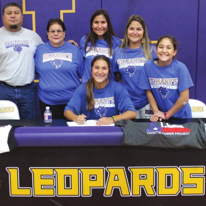 La Grange senior softball star Abigail DelaRosa held her signing ceremony Thursday to celebrate officially accepting a scholarship offer to play college ball for St. Mary’s University in San Antonio. Shown here is Abigail, front and center. Back row, left to right, are her father Lorenzo, grandmother Mary, sister Alyssa, mother Myra and sister Anabella.
