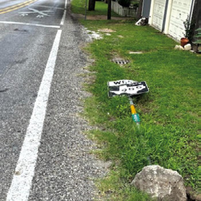 FM 955 street sign downed by 18-wheeler.