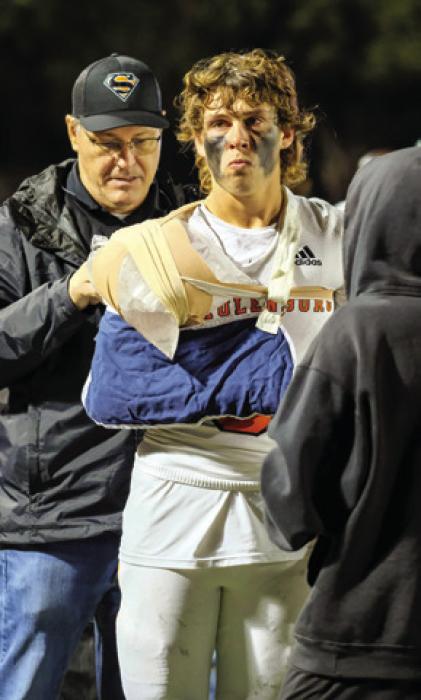 Shorthorn quarterback Aaron Janacek came out of the game with an injured shoulder just before halftime.