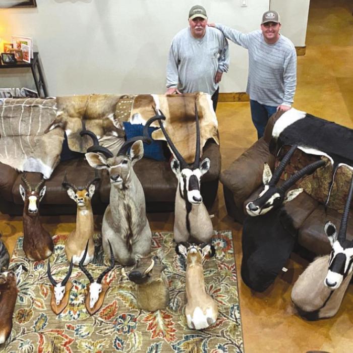 Ryan and Bobby Hentschel with the mounts from their South African hunting trip.