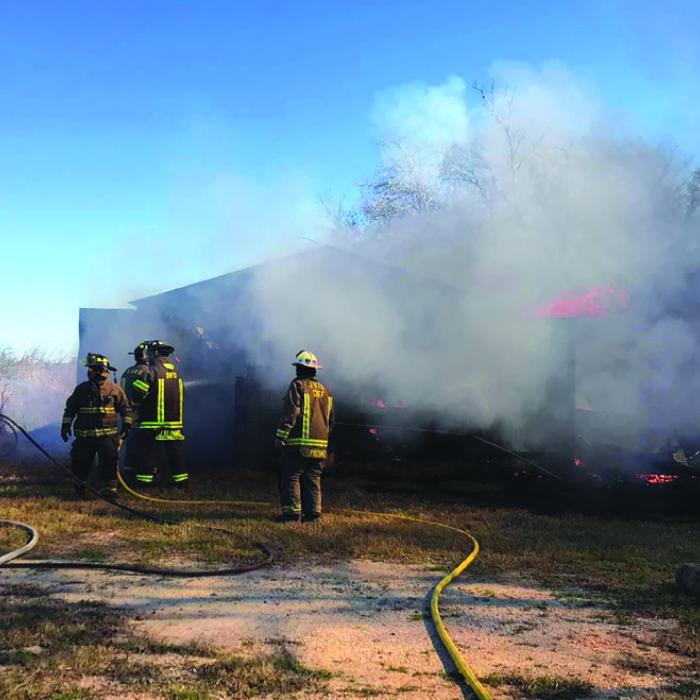 A barn on property along US 77 north of Schulenburg burned Friday. Photo by Schulenburg Volunteer Fire Department.