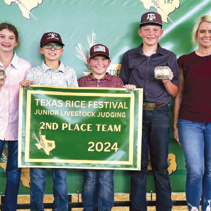 Reserve Champion Junior Team: Laramie Laake, Tate Fritsch, Hudson Holub, Holden Holub, and Coach Kaci Carrales.