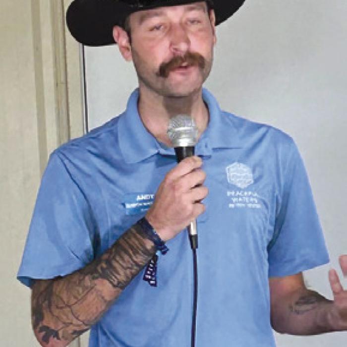 Andy Jozwik from Peaceful Waters Ranch spoke at the Warda Neighbors Night Out.