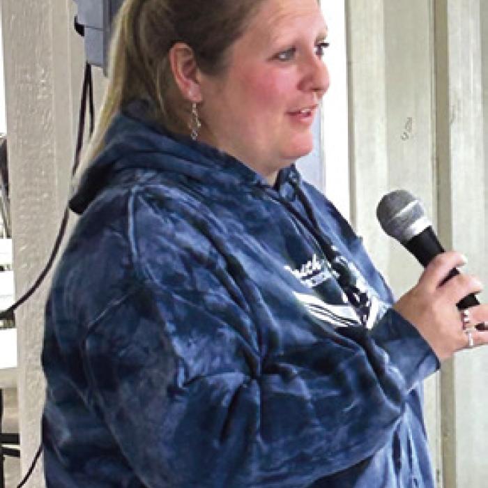 Nikki Kueck from Faith Lutheran High School spoke at the Warda Neighbors Night Out.