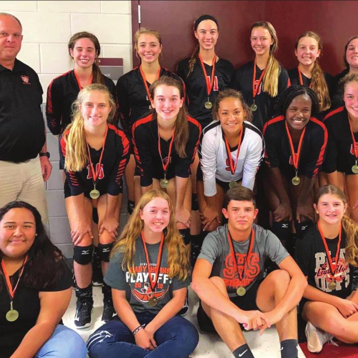The members of the Schulenburg volleyball team pose after winning the Silver Bracket title at their home tourney Saturday.