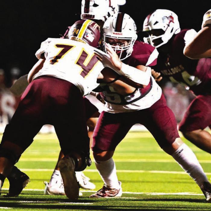 Rambo Ramirez blocks for the Flatonia Bulldogs in Friday’s game against Thorndale.