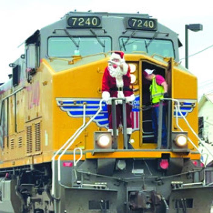 Hundreds Greet Santa’s Arrival by Train into La Grange Saturday