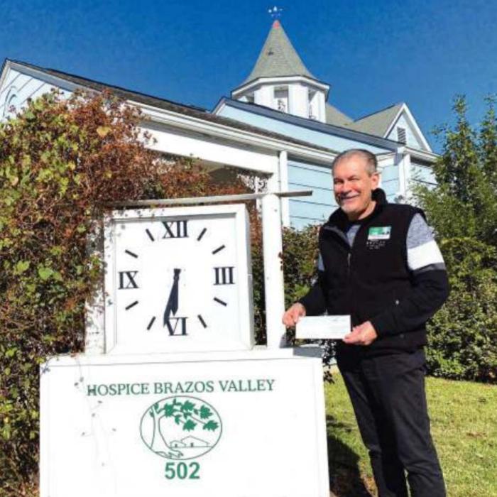 Local Co-ops Donate to AMEN & Hospice Brazos Valley
