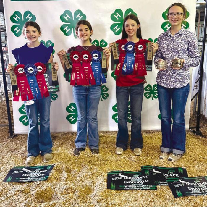 Champion Junior Team: Laramie Laake, Adalyn Carrales, Alexis Berckenhoff, and Tatum Fritsch.