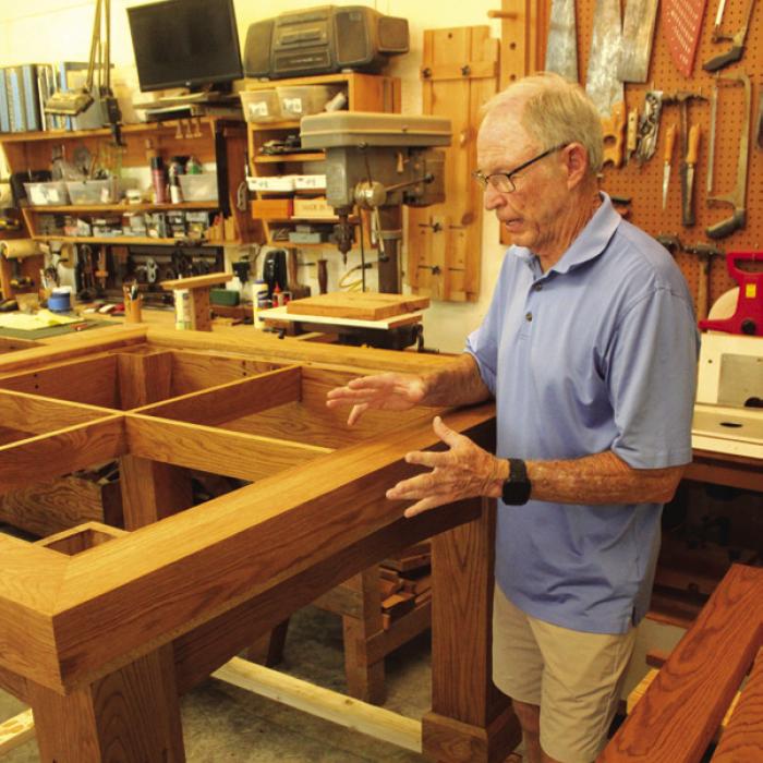 Bob Stanzel in his workshop outside La Grange talking about the construction process of the altar.