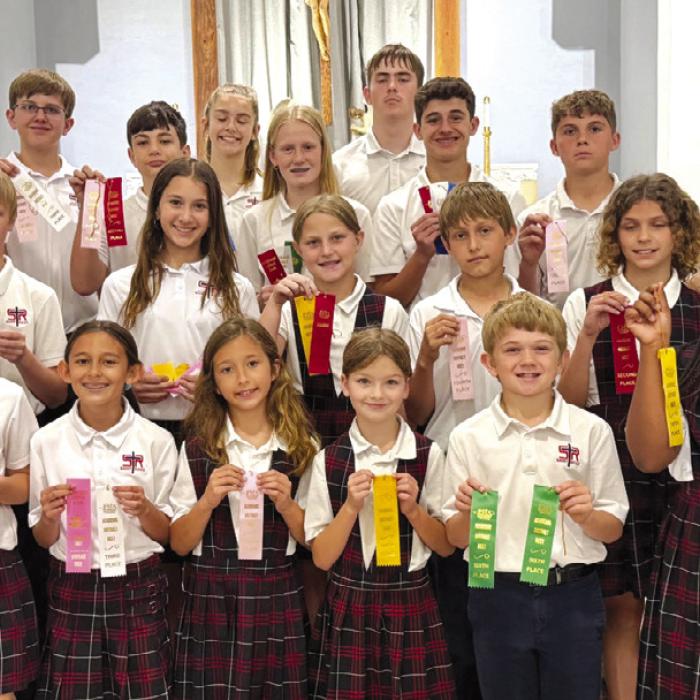District Winners front, from left: Rowan Heinrich, Emma Zweschper, Margot Machac, Harper Wright, Benjamin Sustr, Ava Boston; second row: Sebastian Lincoln, Brielle Goedrich, Emileigh Divin, Kasen Zbranek, Lane Schiffli; back row: Luke Goedrich, Levi Johnson, Micah Garcia, Cate Hooper, Briley Hartensteiner, Kaleb Zapalac, Cal Schiffli, Jack Schiffli, and Noah Heger.