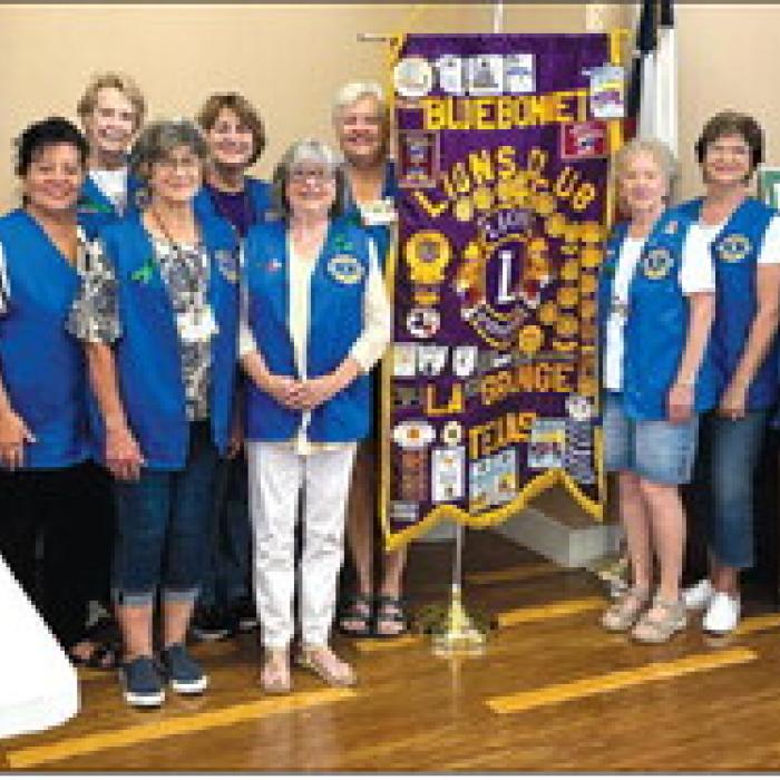 Bluebonnet Lions in attendance left to right, Rochelle Tyler, Tammy Oehlke, Lynnette Boyd, Suzette Zarr, Dale Throckmorton, Sherry Dittrich, Rhonda Koether, Cheri Collision (President), Gracie Albright (Secretary), Carolyn Buchanek, Jeannie Bertsch (Vice President), Krystle Bloodsworth, Loretta Ulrich (Treasurer) and Deborah Hinkley. Hinkley received a pin for 20 years of service and Dale Throckmorton received the Martin Jones Fellowship Award.