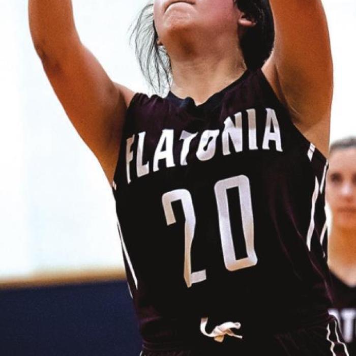 Elzah Herrera shoots for two for the Flatonia Lady Bulldogs Tuesday night in Weimar. Photo by Stephanie Steinhauser