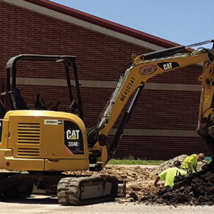At La Grange High School sewer line replacement is progressing. Here’s how it looked Tuesday. They are trying to get the parking lot portion completed before school starts. Photo by Meadow Taylor-Marklin
