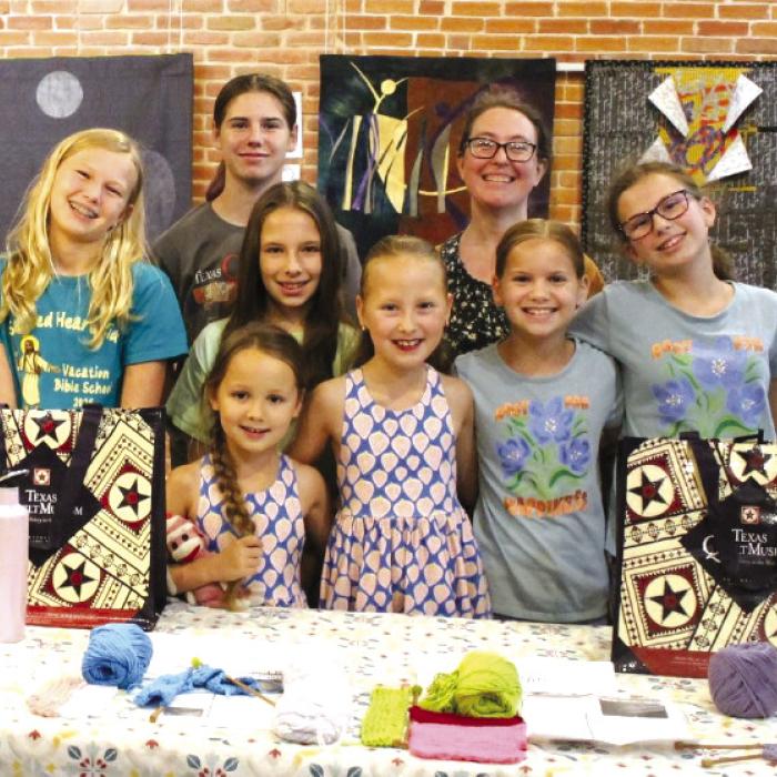 Texas Quilt Musuem ARTS Kids Beginner Knitting Camp from left: Reagan Zapalac, Mekenna Emmel; Scarlett Posas, Hannah Conners, Lillie Posas, Keri Gabrielle, Ava Weid, and Amelia Biernacki.