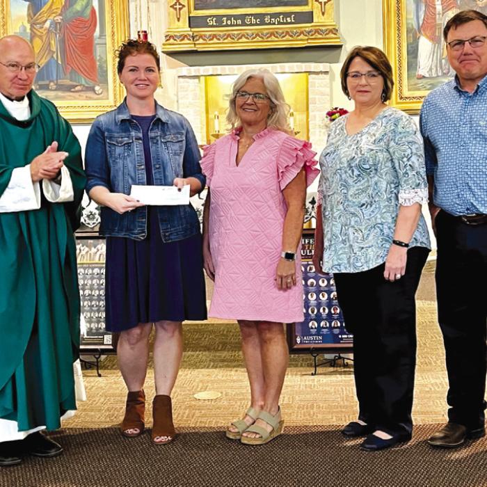 St. John the Baptist Catholic Church, Fayetteville, dedicated a percentage of this year’s annual feast proceeds to Hospice Brazos Valley. A check in the amount of $9,000 was presented by Father Steve Sauser at the Sunday morning Mass. Receiving the check for Hospice Brazos Valley were nurses, Liz Jones and Kelly Muzny. Pictured are Father Steve, Liz Jones, Kelly Muzny and Feast Chairs, Jean Muske and John Spiess.