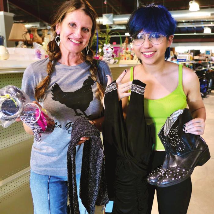 Dawn Sedlar and her daughter, Camryn, had an “80s Nite” party to attend and they needed outfits. So they came to Second Chance Emporium in La Grange. Of course. The non-profit is open 9 a.m.-3 p.m. every Friday and Saturday and is filled with items from most every decade. Photo by Bill Bishop
