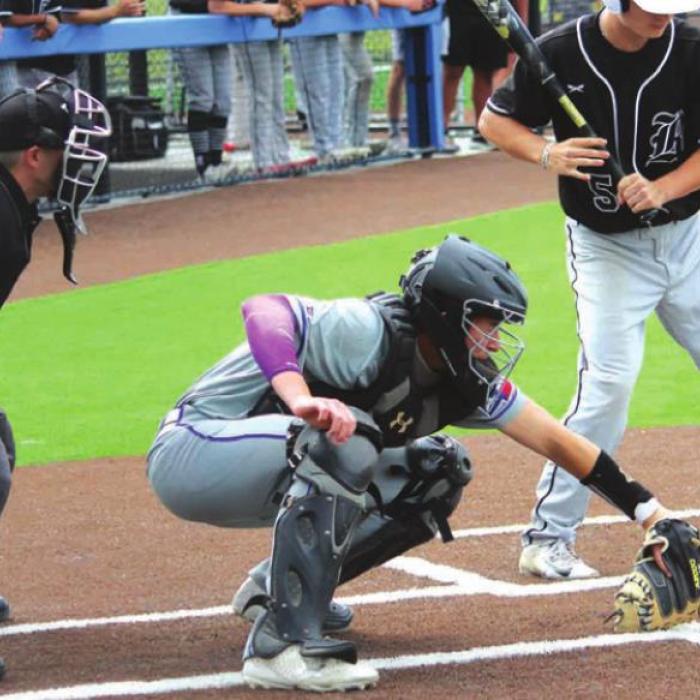 La Grange catcher Kadyn Hall snags a pitch in Thursday’s game.