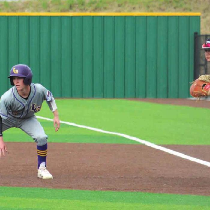 La Grange pinch runner Gunner Jurek leads off first base in Thursday’s game.