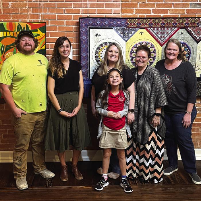 Performers take a break from rehearsal at The Texas Quilt Museum Thursday for this photo. From left to right: Brandon Theut, Jenny Townzen, Tanya Tousek and her daughter Bailey, Regina Keilers and director Heather Barthelme. Not pictured Jeff Wick (because he was taking the photo).