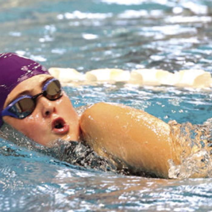 Laney Herdler, in the 500-yard freestyle, broke her own record twice during the meet, shaving a total of 2.05 seconds to set a new mark of 7:13.19. Photo by Katy Michalke