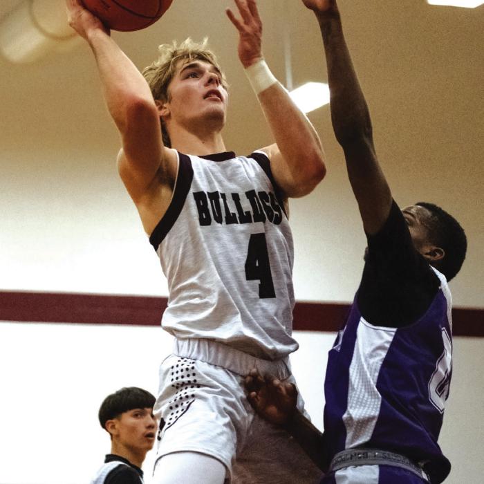 Flatonia’s Holden Kloesel goes up for a shot in Tuesday’s victory over Calvert. The Bulldogs have started the season 6-0. Photo by Stephanie Steinhauser
