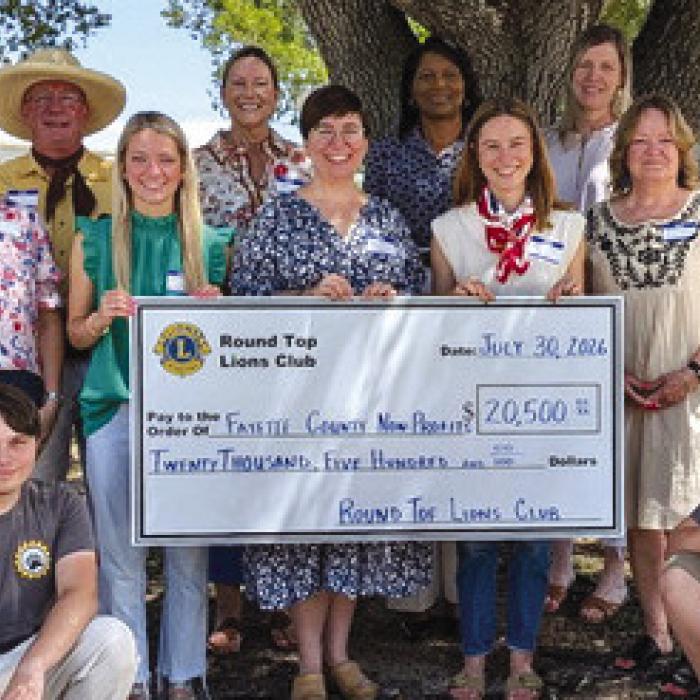 Members of the Round Top Lions Club recently made donations.