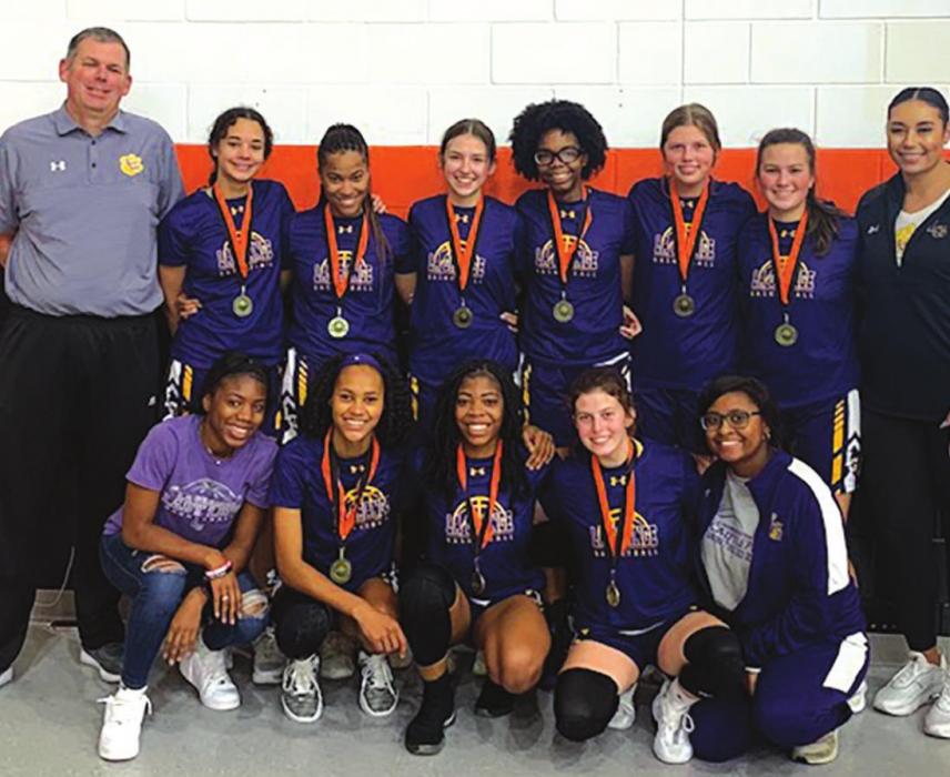 The members of the La Grange girls varsity basketball team pose after they won the title at the Schulenburg Tournament last week.