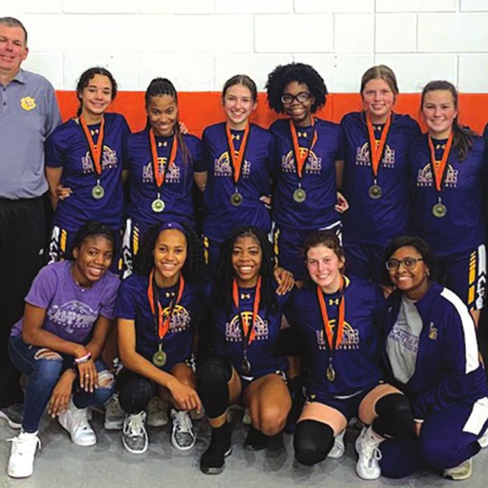 The members of the La Grange girls varsity basketball team pose after they won the title at the Schulenburg Tournament last week.