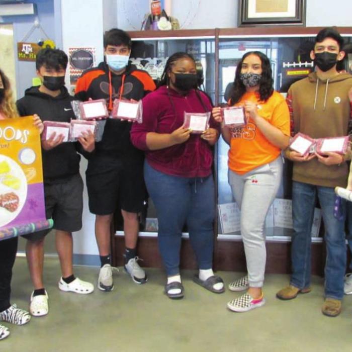 Schulenburg ISD receives beef. Pictured from left: Katy Henke, Lupita Toro, David Valazequez, Kevin Nieto, Nia Bacon, Dayasksi Tbarra, Alex Jiminez, Kathy Kutac/NVCW, and Ricky Toro.