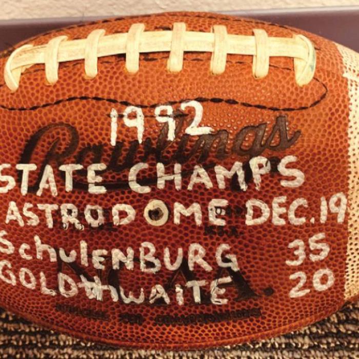 A signed gameball from the 1992 2A State Championship Game between Schulenburg and Goldthwaite.