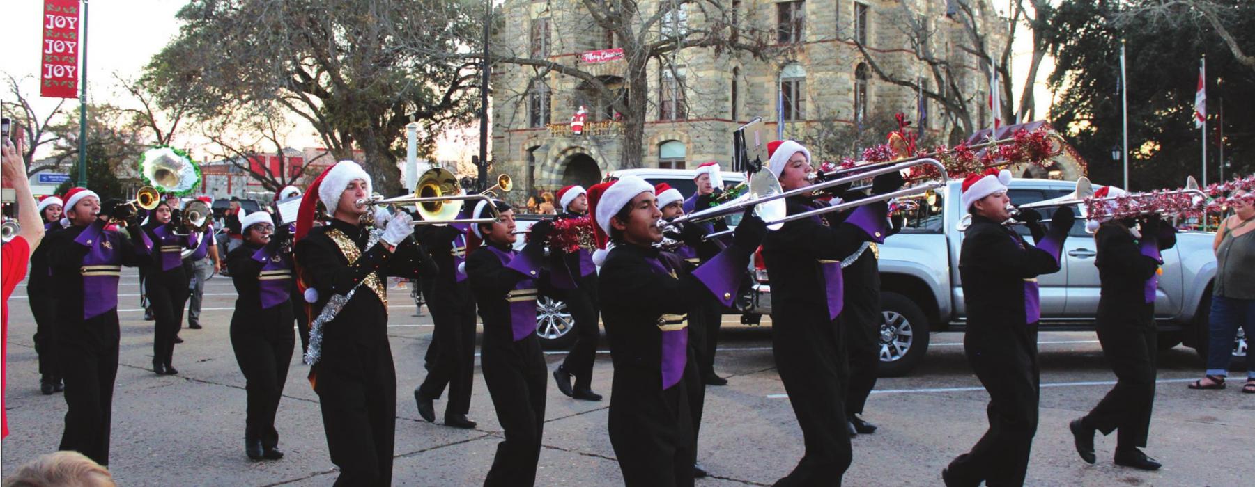 The members of the La Grange High School Band march during the Schmeckenfest parade Thursday. Photo by Jeff Wick