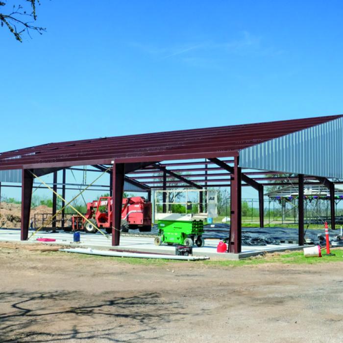 Supak’s Building and Roofing began framing the new German-Czech Mart at the Fayette County Fairgrounds this week. Workers had assembled most of the structural iron by Wednesday, March 19, with roofing work to follow. Staff photo by Andy Behlen