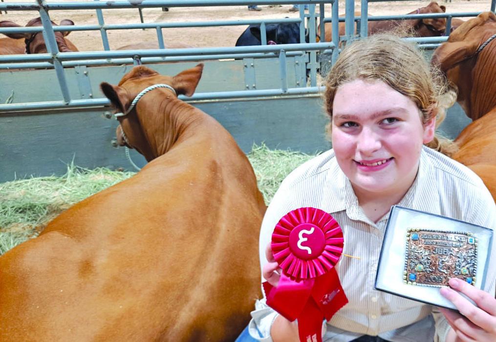 Rheagan Karisch placed second, fifth, and sixth with her heifers at the Emmons Ranch JBBA Cattle Show recently.
