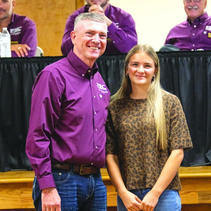 Sophie Vinklarek, right, received the cooperative’s Luck of the Draw Scholarship. She is pictured with FEC general manager and CEO, Doug Lambert.
