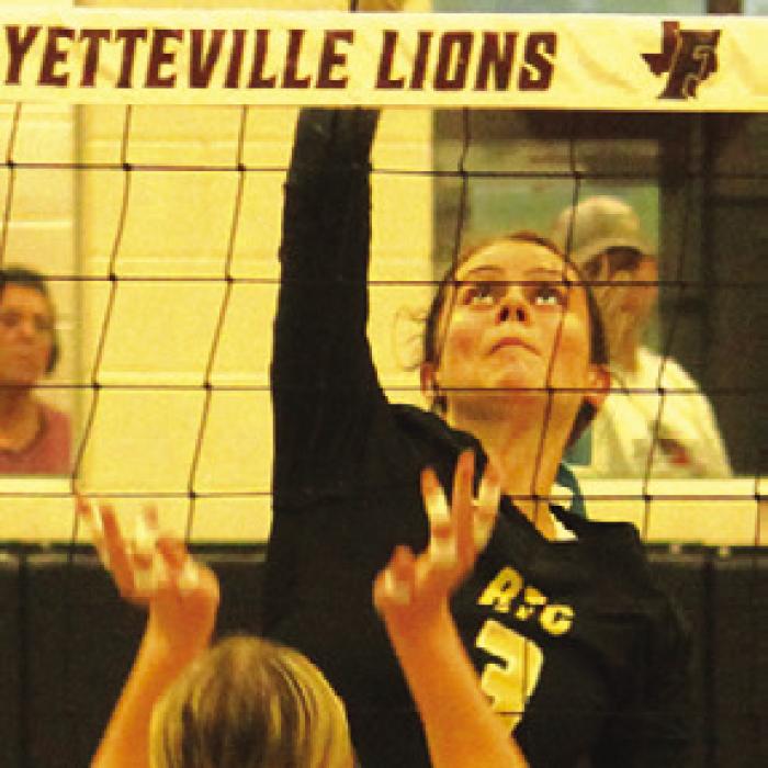 Round Top-Carmine’s Mallory Krause spikes a ball Tuesday. Photo by Jeff Wick