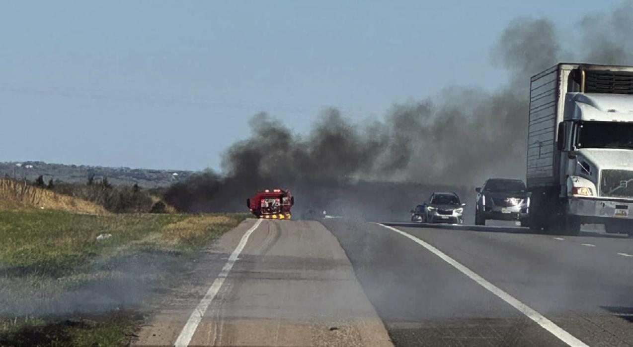 Firefighters from Flatonia, Schulenburg and Muldoon all assisted in putting out a series of grass fires along Interstate 10 near Flatonia on Friday afternoon, Feb. 23. Photo courtesy of the Fayette County Sheriff’s Office