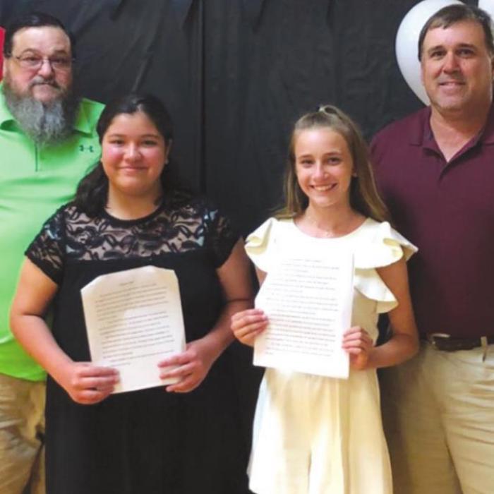 2nd place winner, Destani Brown, with her father, David Brown and 1st place winner, Jenna Guentert, with her father, Darren Guentert.