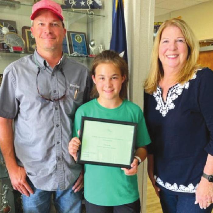 3rd place winner, Ella Herzik with her father, Russell, and NVCW BFFD Chair, Suzette Surman.