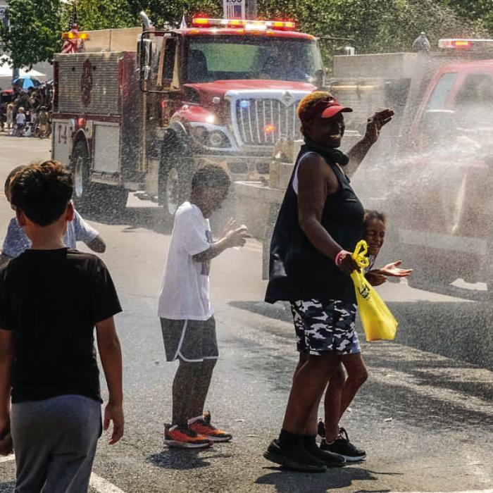 The Schulenburg Volunteer Fire Department cooled down the crowd during the Schulenburg Festival Grand Parade on Sunday morning. Photo by Andy Behlen