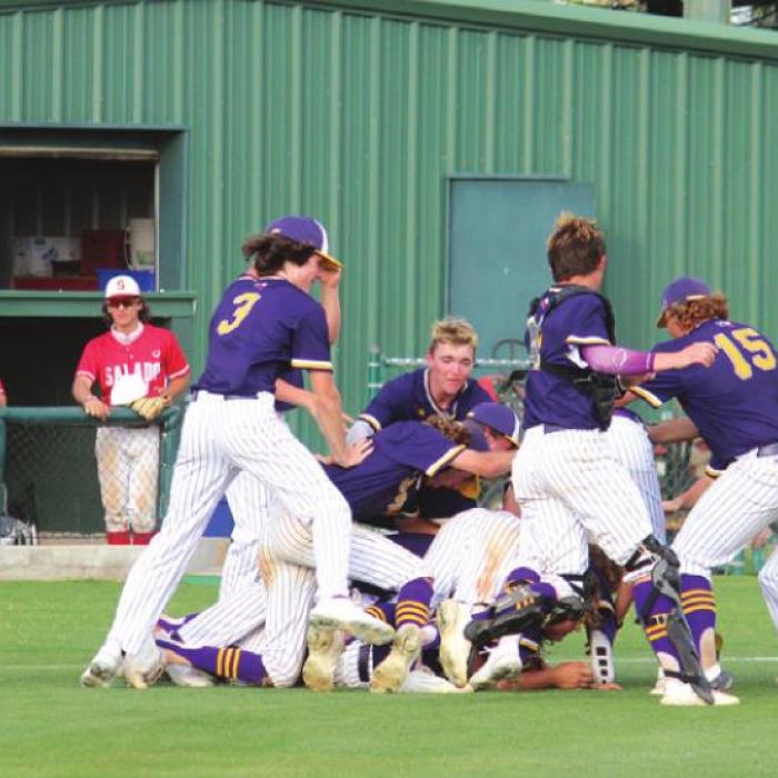 The Leps pile on one another after Saturday’s victory on Game 3.