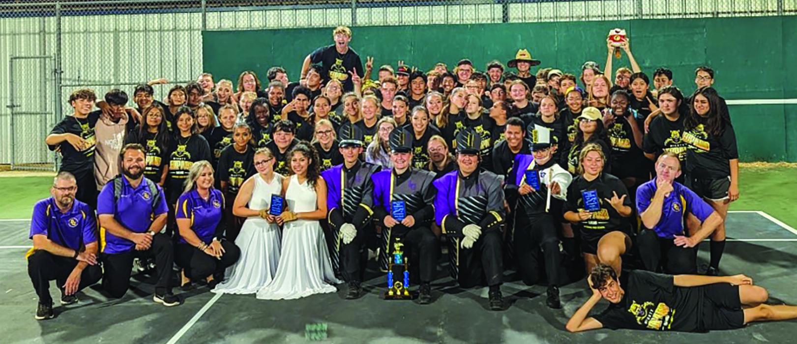 The La Grange High School band poses with their hardware after the Edna marching contest.